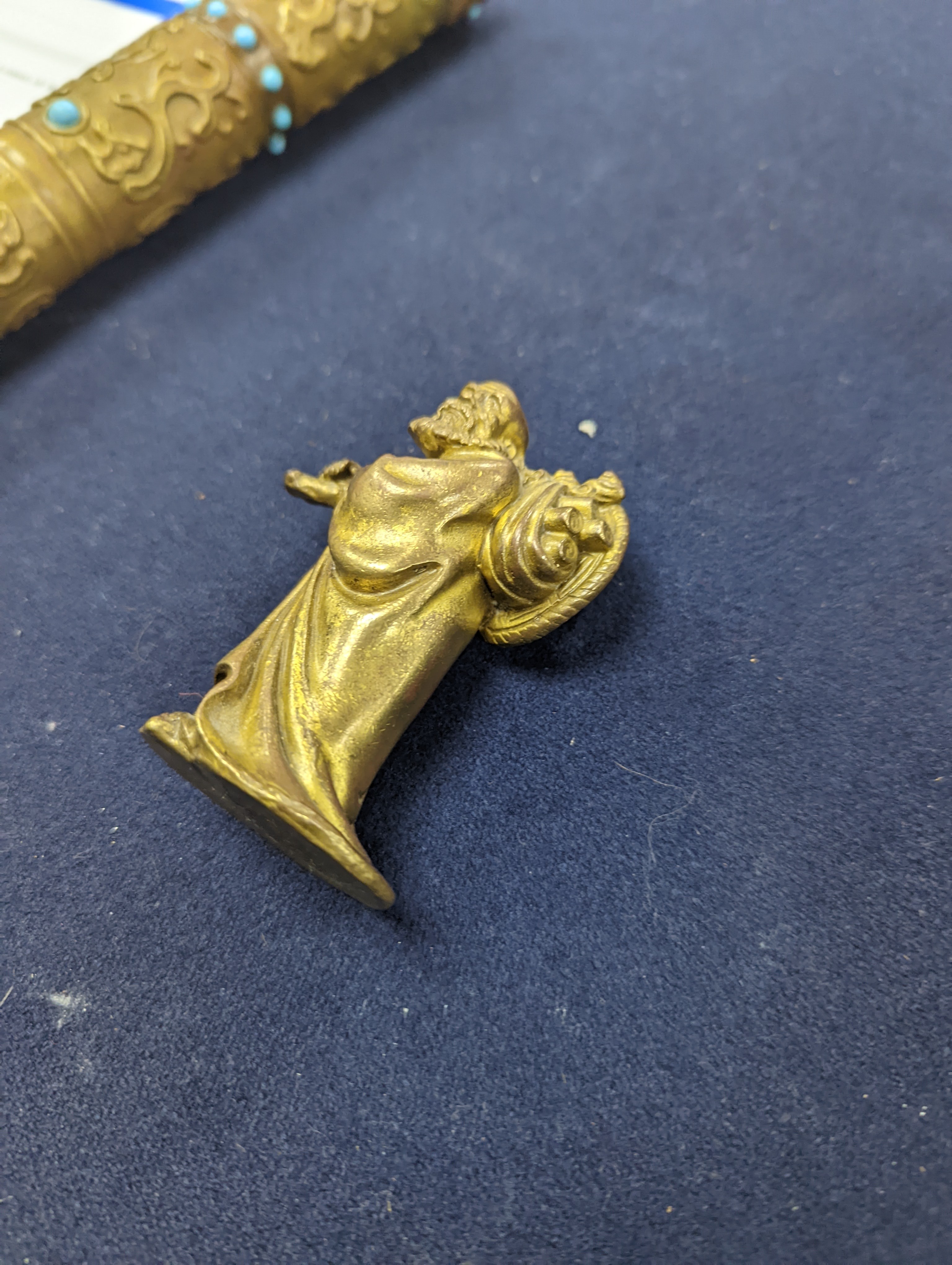 A Chinese gilt copper figure, a Chinese Dog of Fo, a bell, a censer, six Indian bronze figures and a scroll box